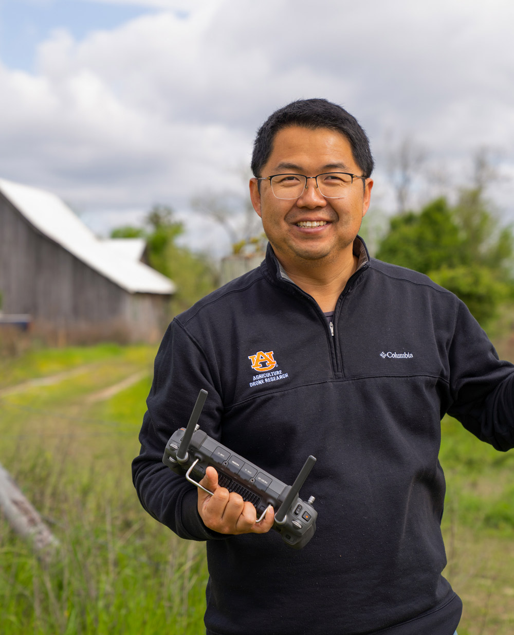 Steve Li holding a drone controller