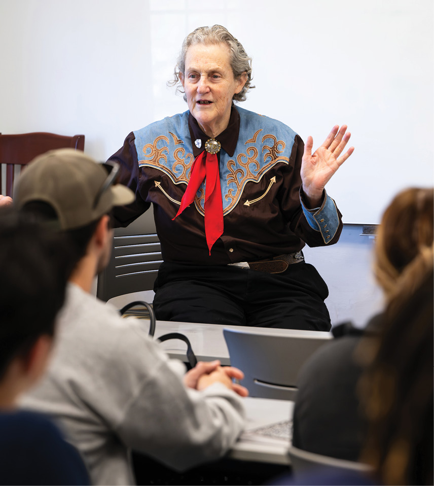 Temple Grandin in mid speech talking to students
